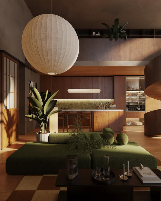 Intérieur mid-century moderne mêlant bois chaleureux, canapé vert olive, suspension boule en papier et cuisine minimaliste, dans une ambiance élégante et lumineuse aux accents naturels.